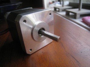 Stepper motor with precision flat